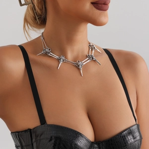 Gothic silver bird skull spike necklace with skeletal chain for punk witch aesthetic