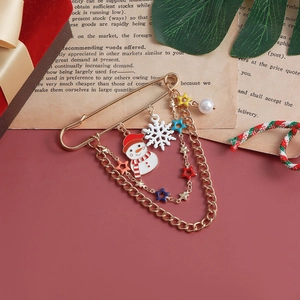 Christmas snowman and snowflake golden safety pin brooch with stars and pearl charms
