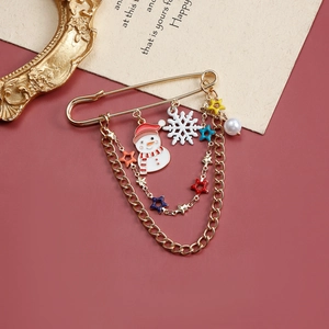 Christmas snowman and snowflake safety pin brooch with golden layered chain and charms