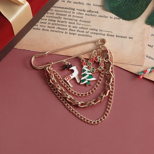 Christmas brooch pin with gold chains, enamel reindeer, xmas tree and wreath charms