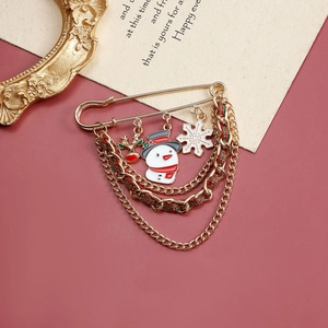 Christmas multilayer gold brooch with snowman, snowflake and reindeer pendants