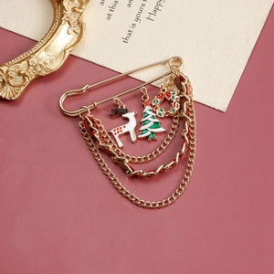 Christmas safety pin brooch with reindeer, tree and wreath charms on gold chains