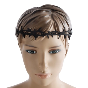 Close-up of a black gothic thorn crown accessory worn on a head model for cosplay