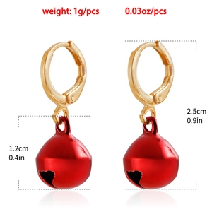 Christmas gold hoop earrings with red bell pendants featuring heart cutout design