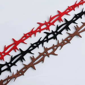 Detailed view of gothic thorn choker necklaces in red black and brown velvet material