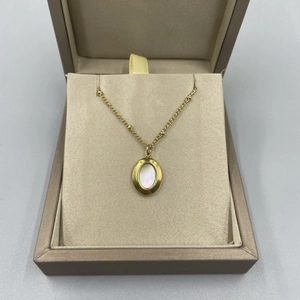 Vintage gold plated bead chain necklace with oval natural shell pendant in jewelry box