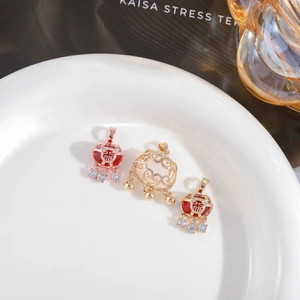 Traditional gold-plated Ruyi lock pendants with cat eye stones and Fu character details