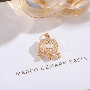 Detailed view of a golden Ruyi lock pendant with white zircons and three small bells