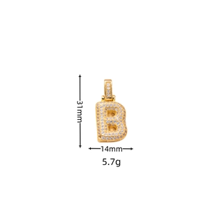 Detailed macro view of 3D gold letter B pendant with micro-pave cubic zirconia stones