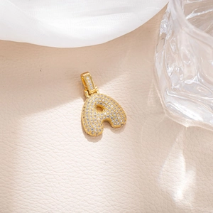Iced out gold letter A pendant with sparkling white cubic zirconia stones for men and women