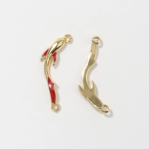 Macro detail of koi fish alloy pendant with red enamel finish and white zircon stones
