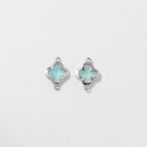 Zilveren klaver en ster hangers met blauwe edelstenen voor DIY sieraden maken