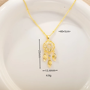 Detailed view of golden dreamcatcher necklace with dimensions 25mm by 13.4mm