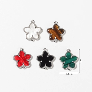 Set of five colorful star-shaped jewelry pendants with silver beaded edge and dual rings