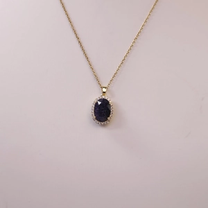 French vintage gold necklace with oval star stone pendant and white diamond halo decor