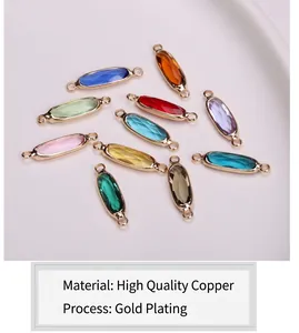 Detailed view of faceted oval crystal connectors with gold-plated copper double loops