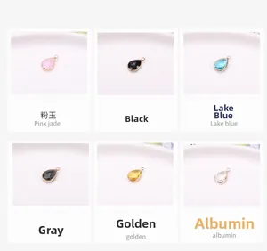 Vue détaillée de pendentifs gouttes en verre cristal doré pour création de bijoux DIY