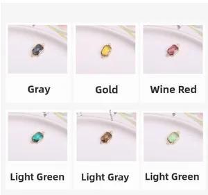 Dettaglio di ciondoli in vetro sfaccettato colorato con bordi placcati oro per gioielli