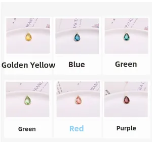 Macro detail of teardrop crystals in six vibrant colors with elegant gold-plated frames