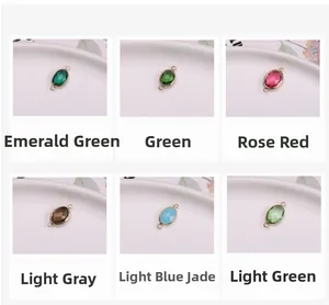 Detail showing six colors of oval crystal connectors with gold double loops for DIY jewelry