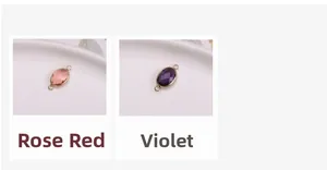 Macro detail of oval faceted crystal connectors in peach and violet colors for jewelry DIY