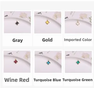 Détails de breloques trèfle à quatre feuilles en cristal coloré et monture dorée à l'or