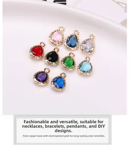 Macro detail of teardrop crystal pendants with gold-plated copper base for DIY jewelry making