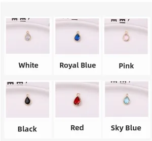Detail of water drop crystal charms with gold-plated edges in six vibrant colors