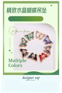 Macro detail of butterfly crystal pendants in multiple colors with gold rhinestone edges