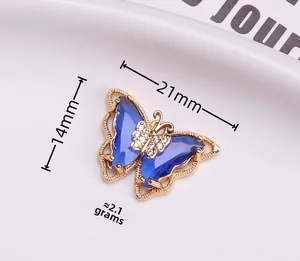 Detailed view of crystal butterfly pendant measuring 21mm by 14mm weighing 2.1g