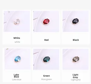 Macro detail of six colorful oval crystal pendants with gold edges for DIY jewelry making