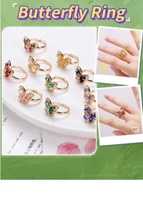 Macro shot of 18K gold plated butterfly rings with colorful crystal butterfly inlay