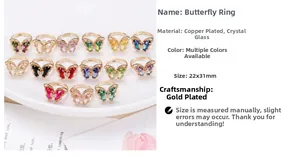 Detailed view of 15 colorful crystal butterfly rings in gold plating with dimensions 22x31mm