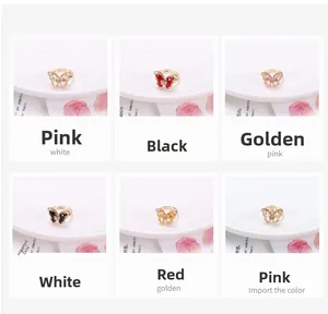 Detailed grid view showcasing crystal butterfly rings in white, red, pink and black colors