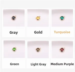Detail of gold plated copper square crystal pendants in six vibrant assorted colors