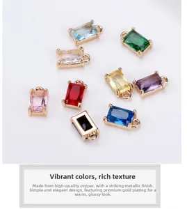 Macro detail of eight colorful rectangular crystal charms with gold-plated copper settings