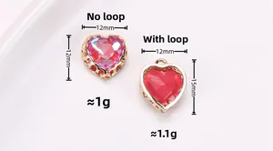 Detail of red heart crystal pendants with gold copper edging in 12mm and 15mm sizes