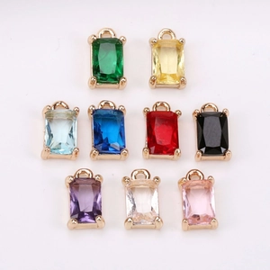 Set of 9 colorful rectangular crystal pendants with gold-plated bases for DIY jewelry