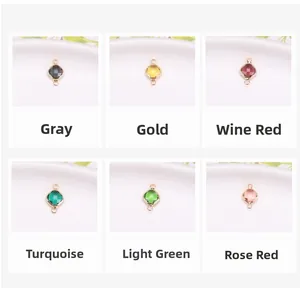 Detail of square faceted glass connectors in six colors with gold-plated double loops