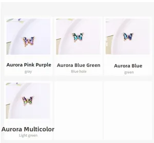 Vista detallada de colgantes de mariposa de cristal en cuatro colores para joyería DIY