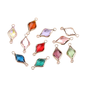 Set of multifaceted diamond-shaped crystal connector charms with gold-plated metal edges