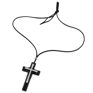 Detailed view of layered black and silver cross pendant on long black wax cord necklace