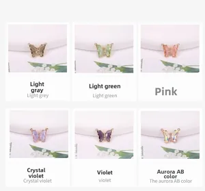 Close-up of 14K gold filled crystal butterfly pendants in six vibrant assorted colors