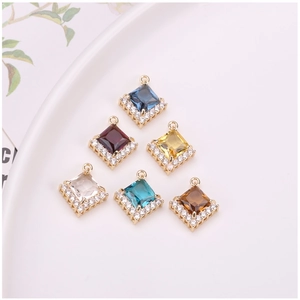 Macro detail of six colorful square crystal pendants with micro-inlaid rhinestones