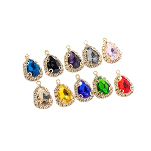 Set di 10 ciondoli a goccia dorata con pietre principali colorate e bordi di diamanti brillanti
