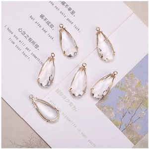 Detail of 14K gold plated water drop pendants with clear faceted crystals for DIY jewelry