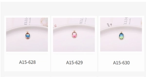 Macro view of gradient tourmaline oval pendants with gold crown settings for DIY jewelry