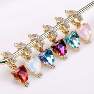 Set of six heart-shaped colorful crystal pendants with gold zirconia-encrusted clasps