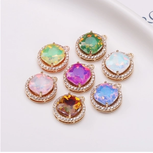 Set of seven cushion-cut crystal pendants with rhinestone halo in various colors