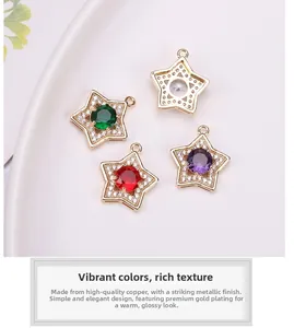 Detail of star-shaped pendants with zircon stones and gold plating for jewelry making